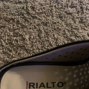 Black peep toe shoes. Tiny scuff on right toe.